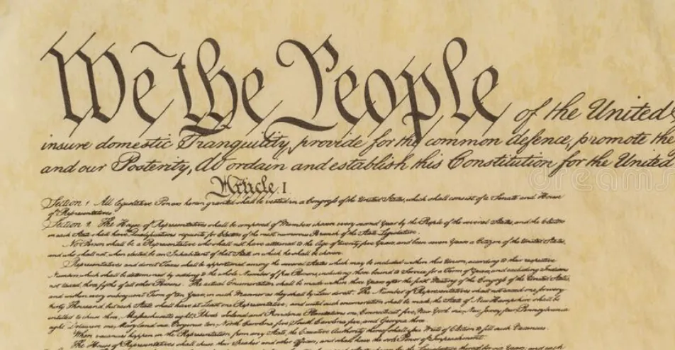 Historic parchment of U.S. Constitution text, Article I visible, aged paper texture.